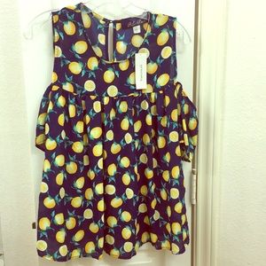 Francesca’s off the shoulder lemon shirt